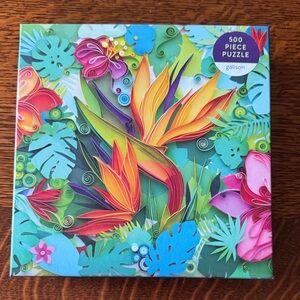 500 piece “Paper Paradise” jigsaw puzzle by Galison
